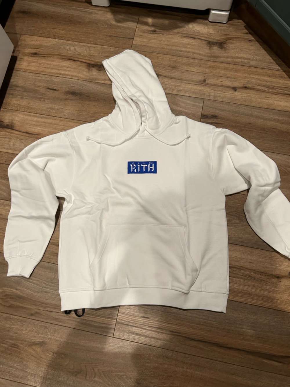 Kith Hebrew Script Hoodie with Blue Logo Patch